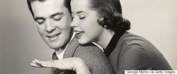 UNITED STATES - CIRCA 1950s:  Engaged couple admiring ring.  (Photo by George Marks/Retrofile/Getty Images)